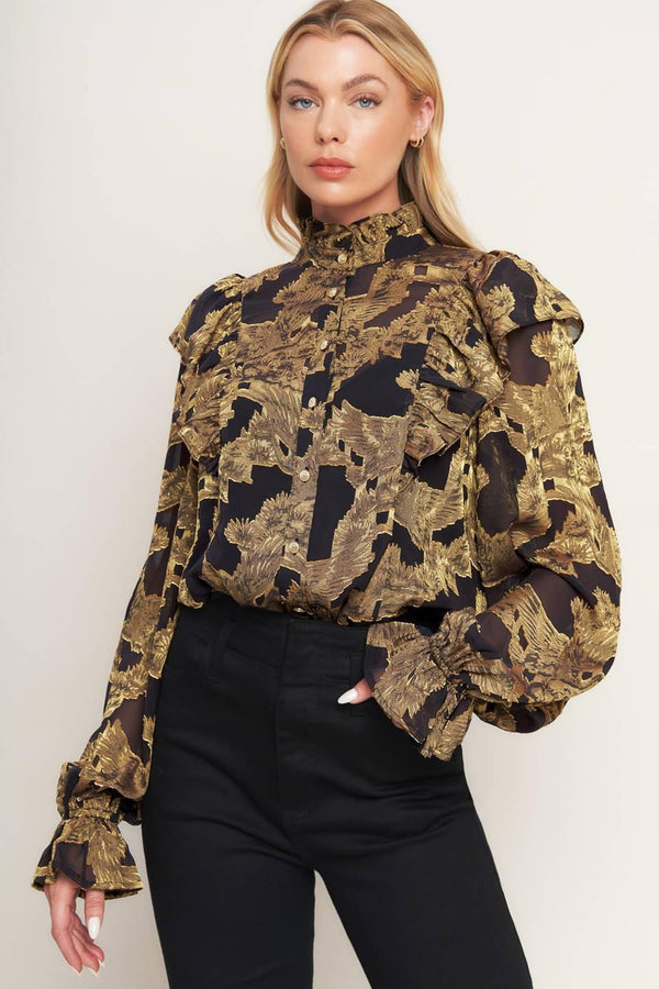 A jacquard woven top featuring high ruffled neckline, front button down, ruffle over shoulder and long sleeve with ruffled cuff