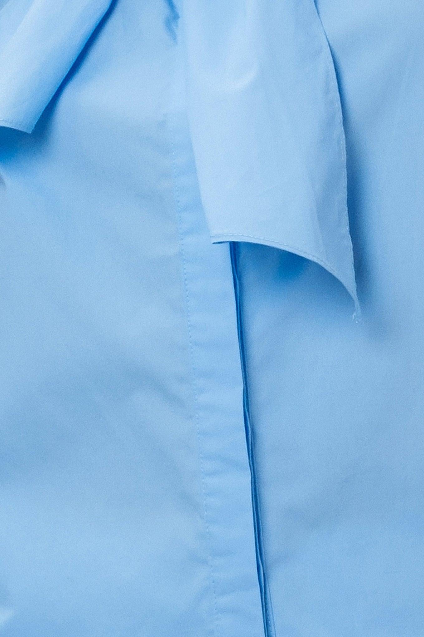 Close-up of light blue fabric with a subtle texture