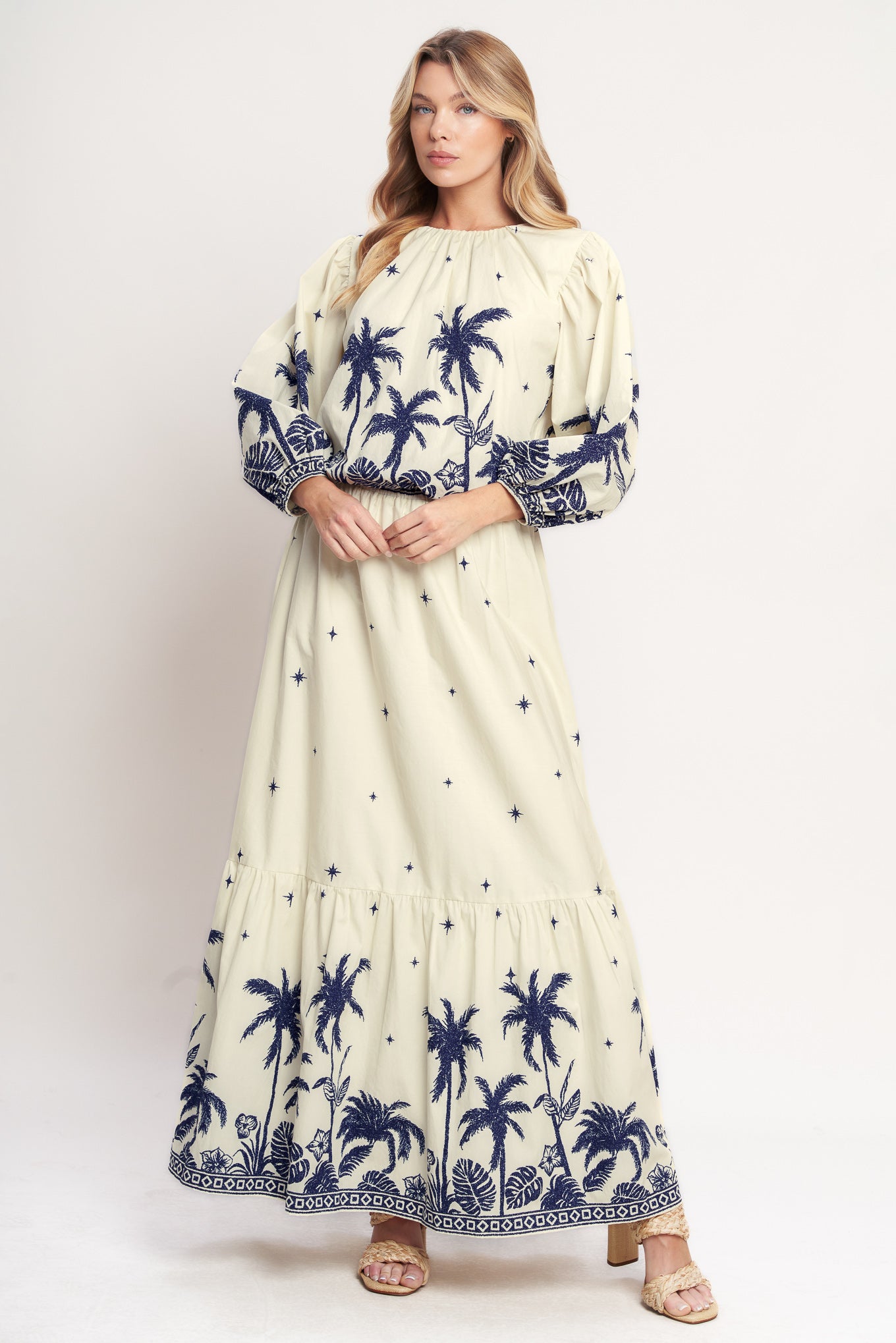 
A printed woven top featuring round neckline, long sleeve and elasticized waist. Matching skirt IK7760T

Details:

Self : 100% Cotton
Lining : 100% Polyester

Size &amp; Fit

- Model is 5`8" And Wearing Size Small
- Measurements Taken From Size Small
- Approx. Length: 20"