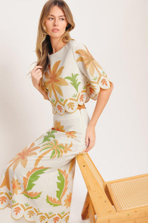 A printed woven crop top featuring round neckline, 3/4 sleeve with scalloped finish and back neck button closure

Details:

Self: 50% Cotton 20% Rayon 20% Polyester 10% Linen

Lining: 100% Polyester

Size & Fit

-Model is 5`8" And Wearing Size Small
-Measurements Taken From Size Small
-Approx. Length: 18"