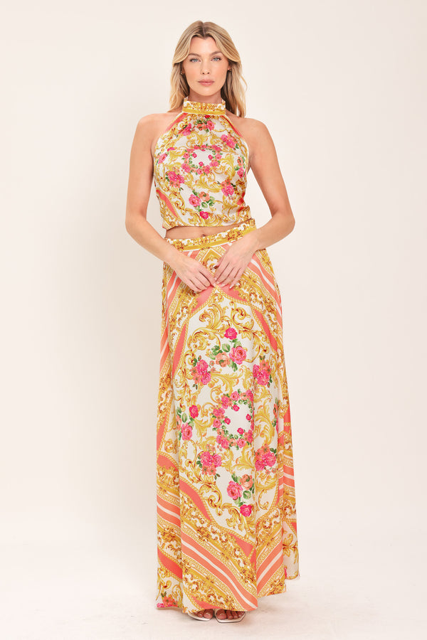 Woman wearing a floral and gold baroque patterned crop top | Flying Tomato