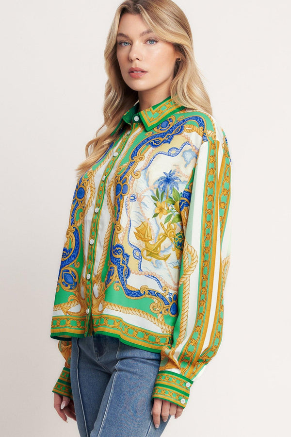 
A printed woven button down top with long sleeve. Matching skort IP9107T

Details:

Self : 100% Polyester

Size &amp; Fit

- Model is 5`8" And Wearing Size Small
- Measurements Taken From Size Small
- Approx. Length: 26"
