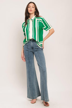 A printed woven top featuring collar, short sleeve and button down. Matching short IP9108T

Details:

Self: 100% Polyester

Size & Fit

-Model is 5`8" And Wearing Size Small
-Measurements Taken From Size Small
-Approx. Length: 26"