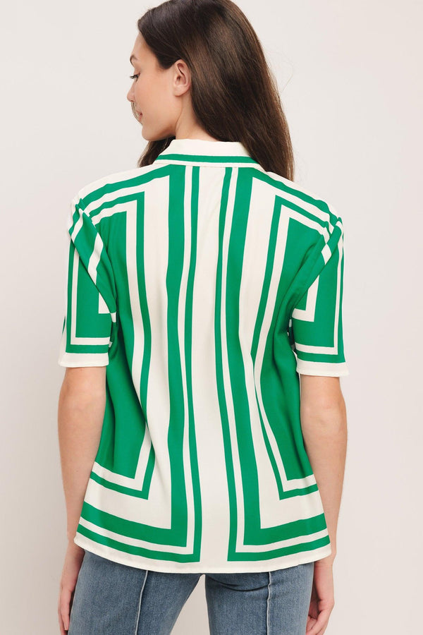 A printed woven top featuring collar, short sleeve and button down. Matching short IP9108T

Details:

Self: 100% Polyester

Size & Fit

-Model is 5`8" And Wearing Size Small
-Measurements Taken From Size Small
-Approx. Length: 26"