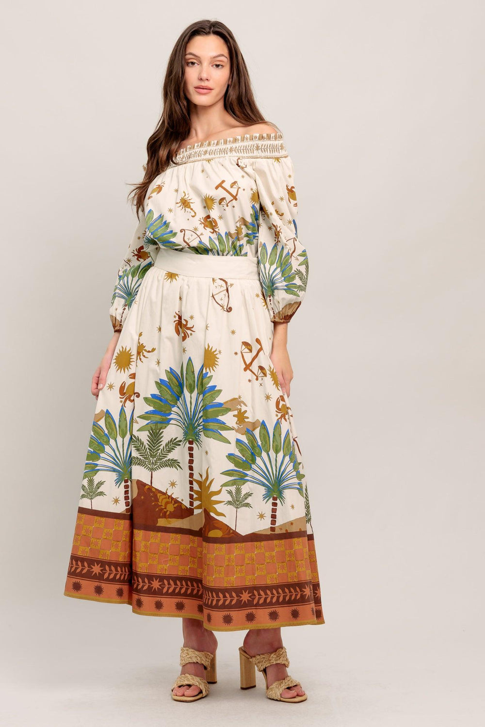 Off-the-shoulder boho blouse with a whimsical zodiac-inspired print and billowy sleeves

Details:

Self : 100% Cotton

Size & Fit

- Model is 5`8" And Wearing Size Small
- Measurements Taken From Size Small
- Approx. Length: 20"