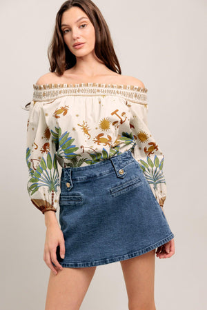 Off-the-shoulder boho blouse with a whimsical zodiac-inspired print and billowy sleeves

Details:

Self : 100% Cotton

Size & Fit

- Model is 5`8" And Wearing Size Small
- Measurements Taken From Size Small
- Approx. Length: 20"