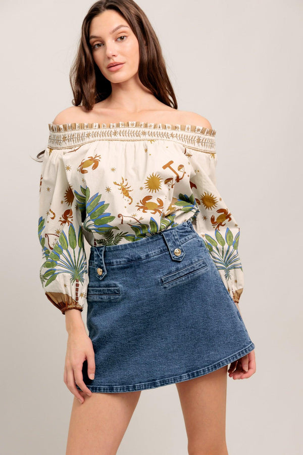 Off-the-shoulder boho blouse with a whimsical zodiac-inspired print and billowy sleeves

Details:

Self : 100% Cotton

Size & Fit

- Model is 5`8" And Wearing Size Small
- Measurements Taken From Size Small
- Approx. Length: 20"