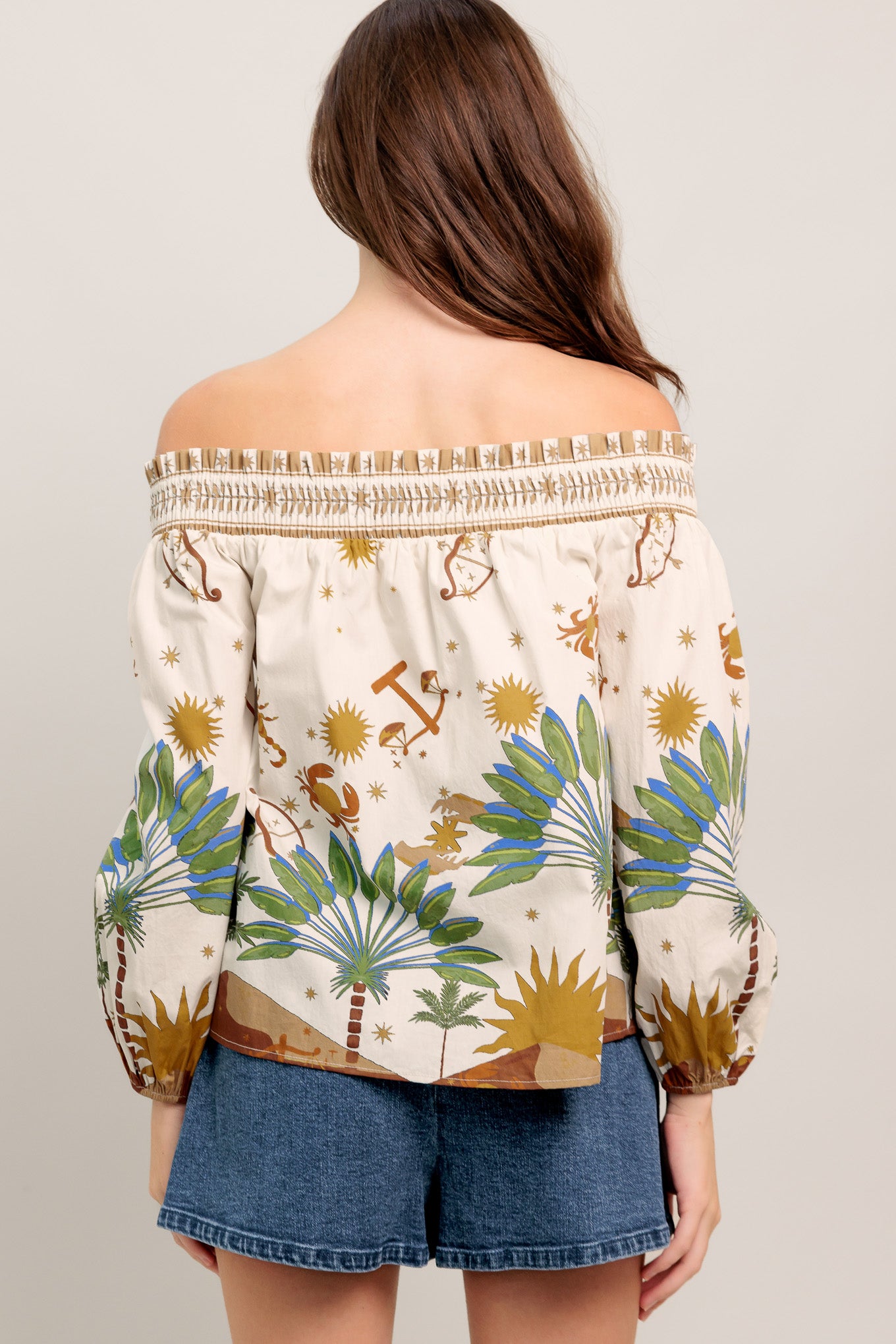 Off-the-shoulder boho blouse with a whimsical zodiac-inspired print and billowy sleeves

Details:

Self : 100% Cotton

Size & Fit

- Model is 5`8" And Wearing Size Small
- Measurements Taken From Size Small
- Approx. Length: 20"