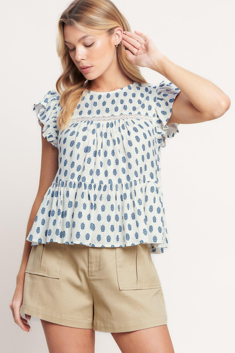 EASY GOING WOVEN TOP.