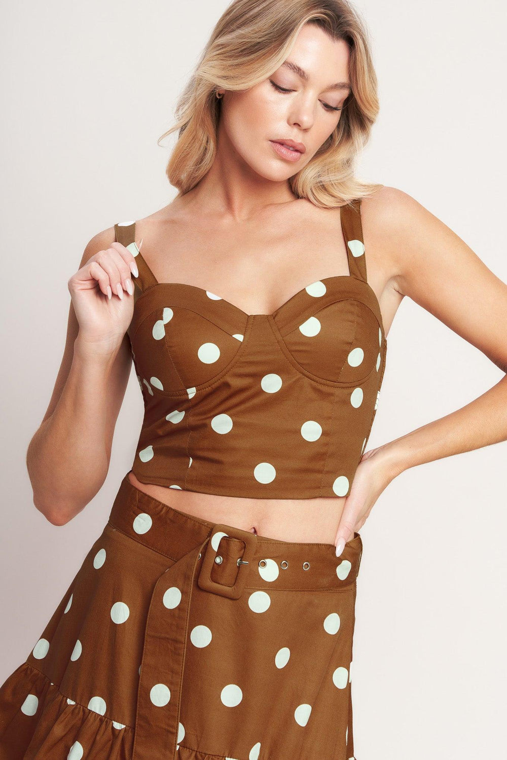 
A printed woven bustier top and smocked back bodice. Matching skirt IK7778T

Details:

Self : 100% Cotton
Lining : 100% Polyester

Size &amp; Fit

- Model is 5`8" And Wearing Size Small
- Measurements Taken From Size Small
- Approx. Length: 16"