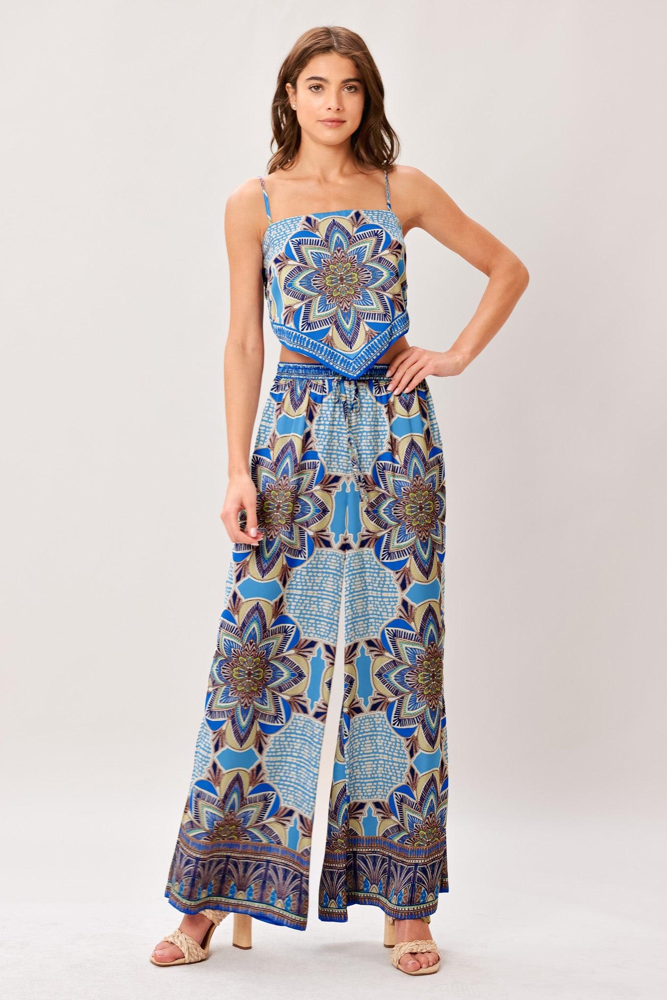 A printed woven scarf top and wide leg pant set