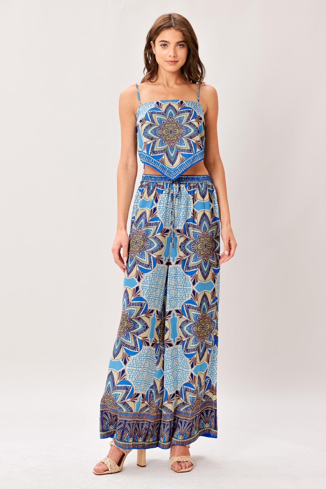 A printed woven scarf top and wide leg pant set