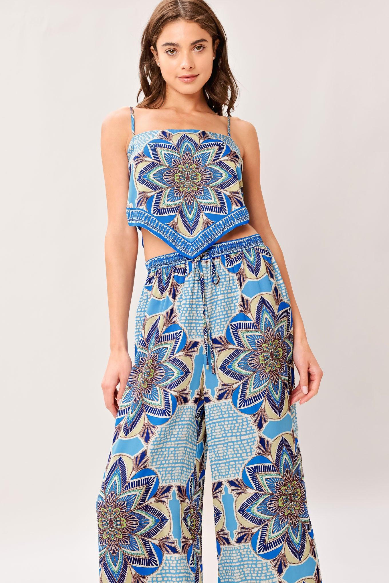 A printed woven scarf top and wide leg pant set