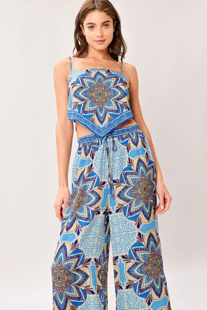 A printed woven scarf top and wide leg pant set