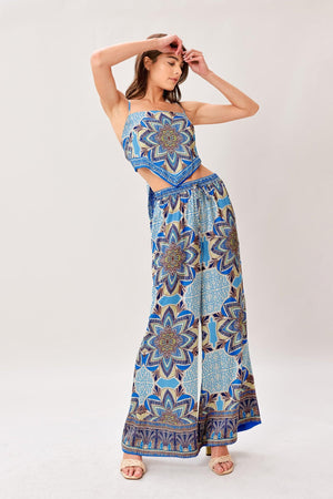 A printed woven scarf top and wide leg pant set
