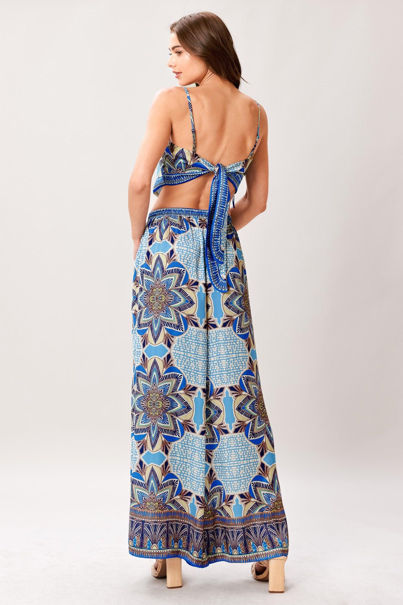A printed woven scarf top and wide leg pant set