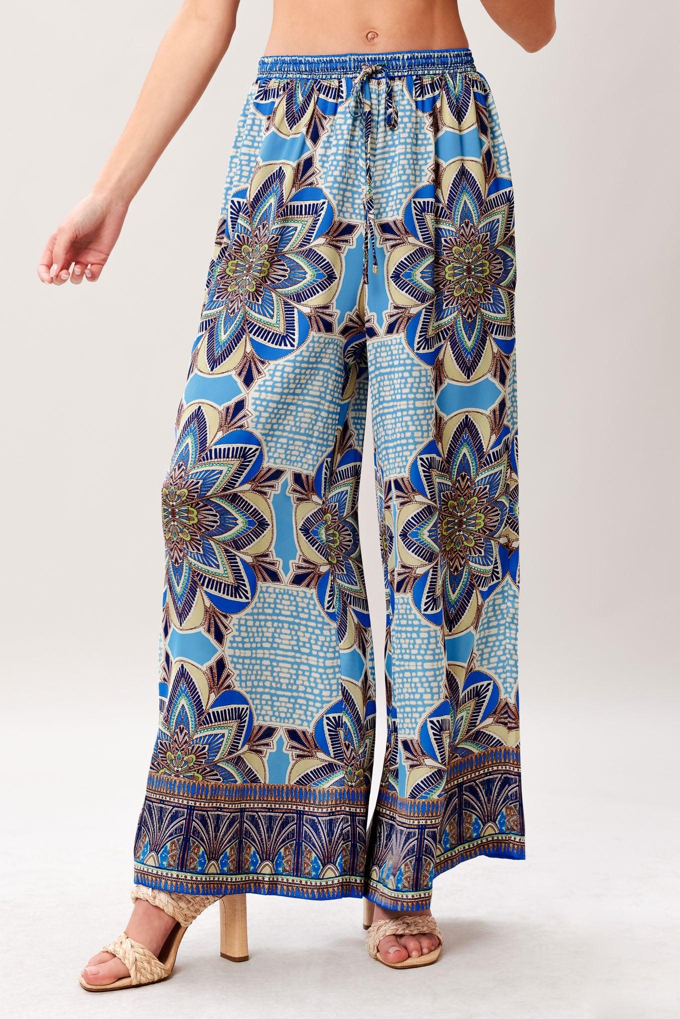A printed woven scarf top and wide leg pant set