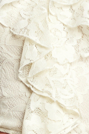 
A woven lace top featuring halter neckline, ruffles, tie back and smocked back bodice. Matching skirt IK7780T

Details:

Self : 90% Nylon 10% Spandex
Lining : 100% Polyester

Size &amp; Fit

- Model is 5`8" And Wearing Size Small
- Measurements Taken From Size Small
- Approx. Length: 18"