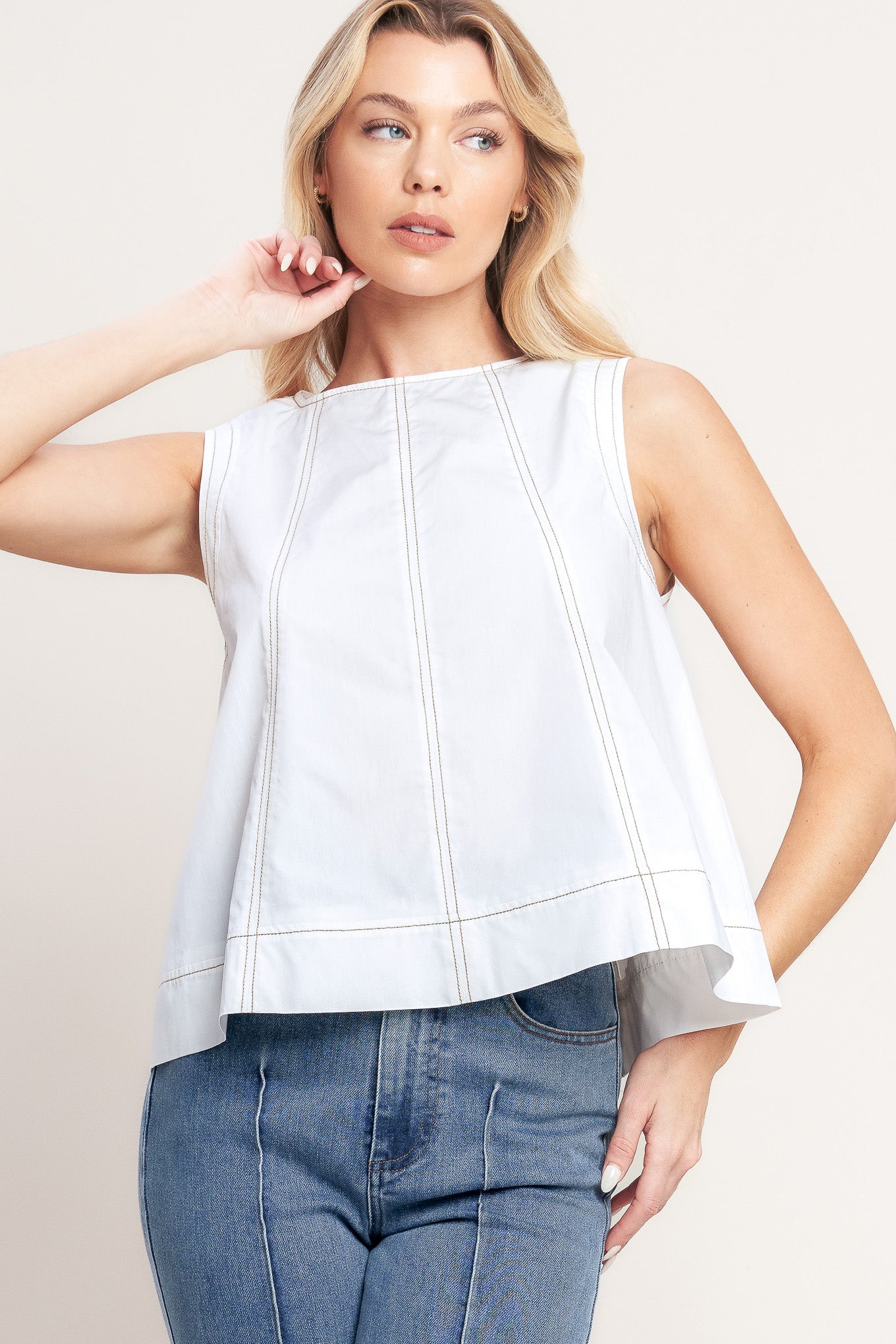 A solid woven top featuring round neckline, sleeveless and back neck tie closure

Details: Self : 100% Cotton

Size & Fit

-Model is 5`8" And Wearing Size Small
-Measurements Taken From Size Small
-Approx. Length: 21"