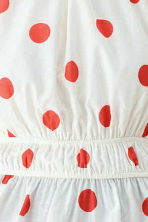 White fabric with red polka dots