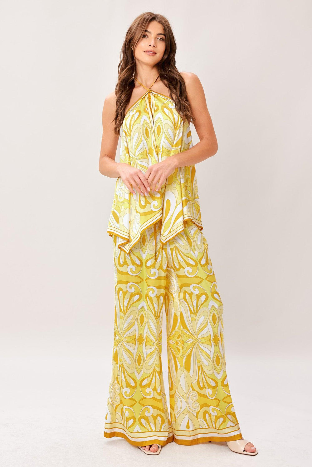 A printed woven hanky top with halter tie