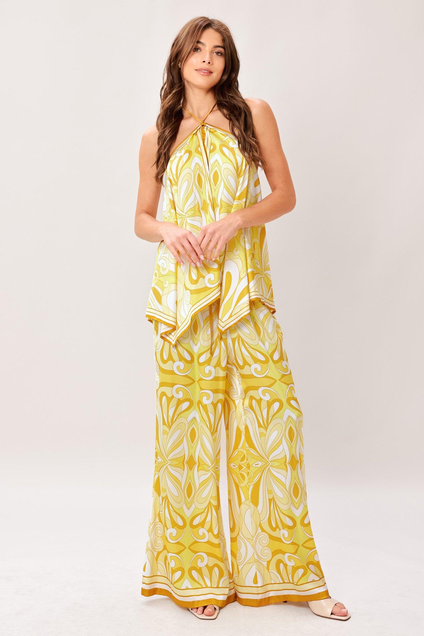 A printed woven hanky top with halter tie