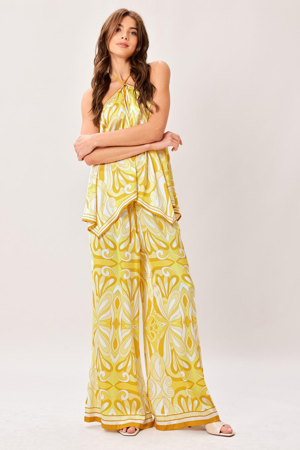 A printed woven hanky top with halter tie