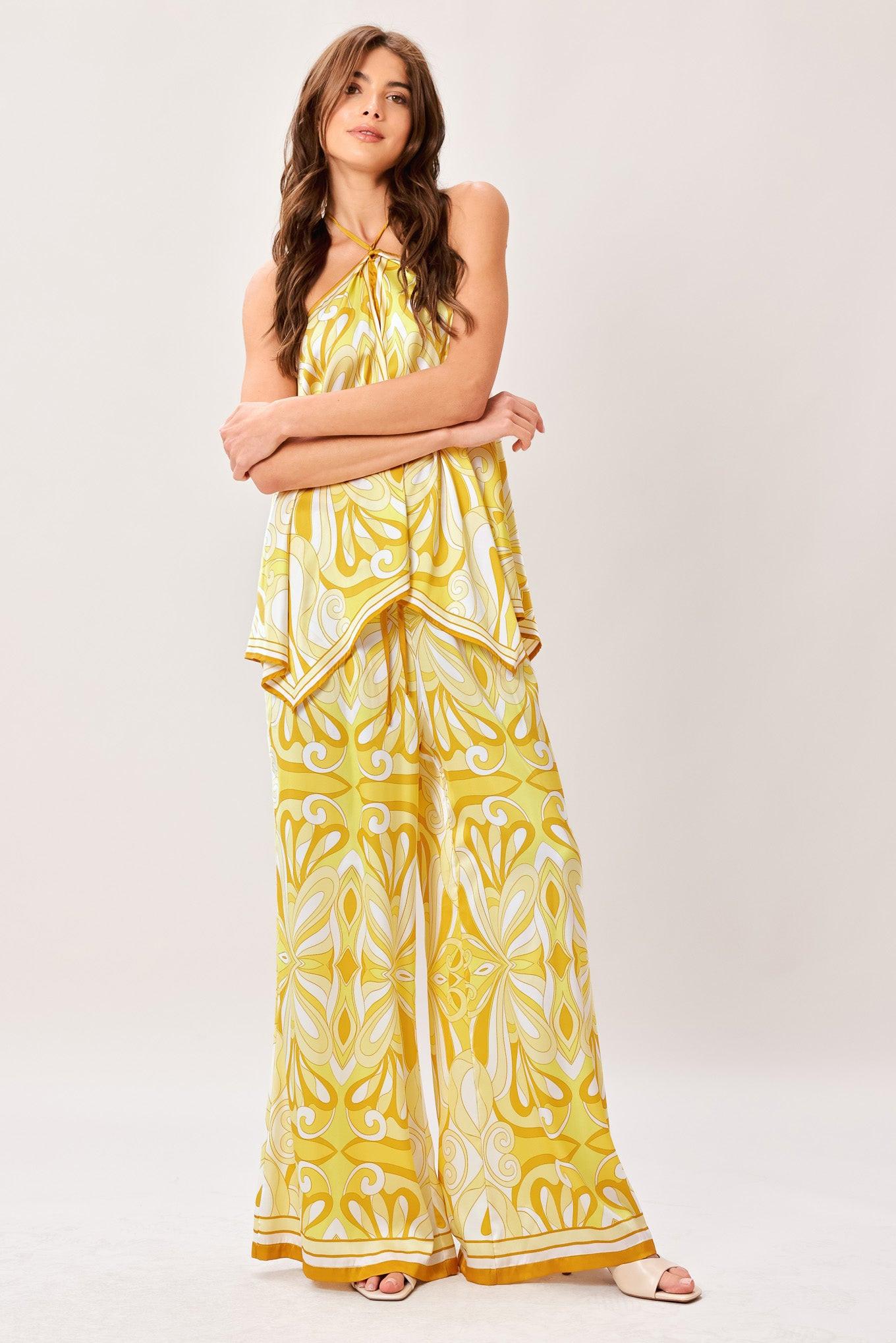 A printed woven hanky top with halter tie