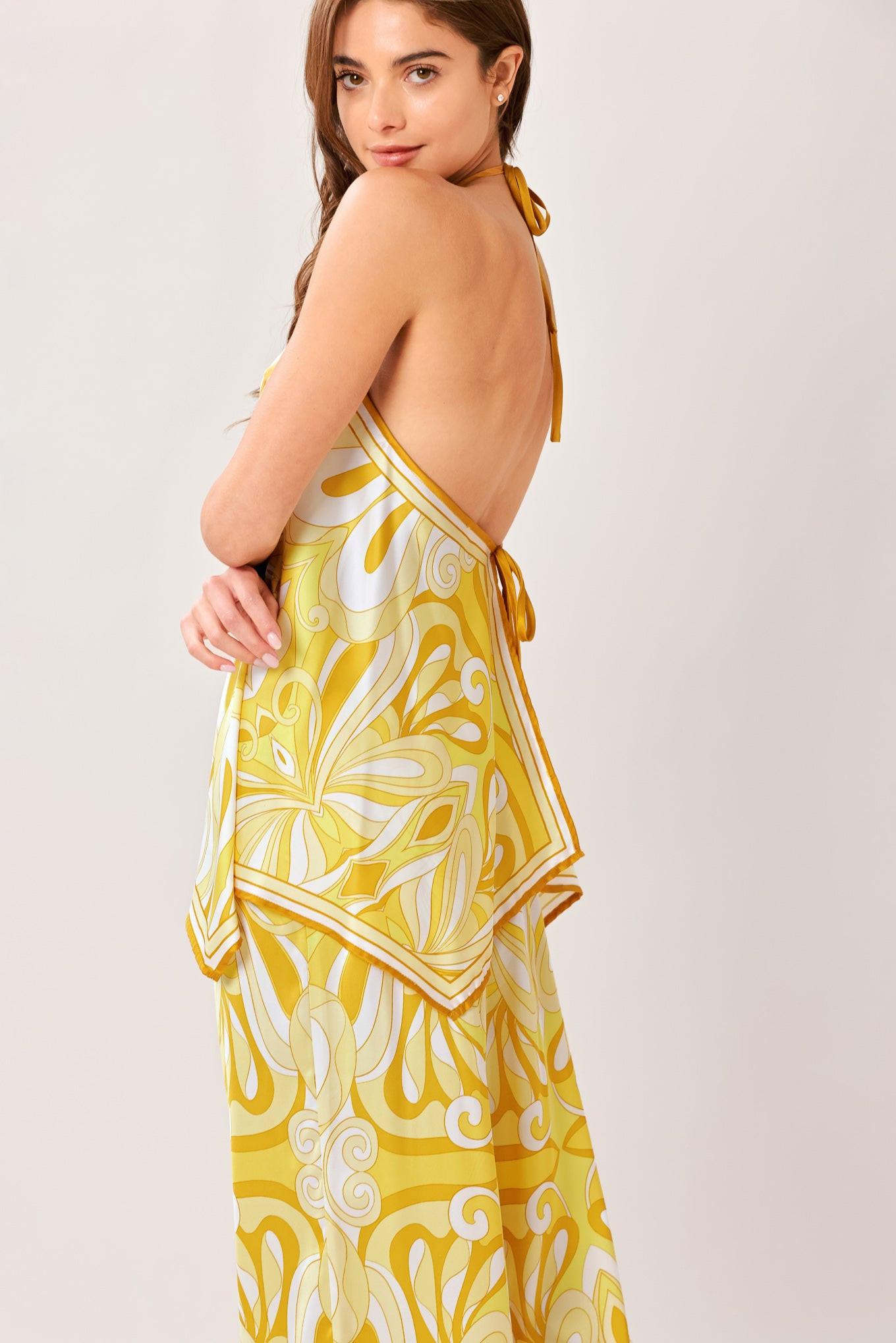 A printed woven hanky top with halter tie