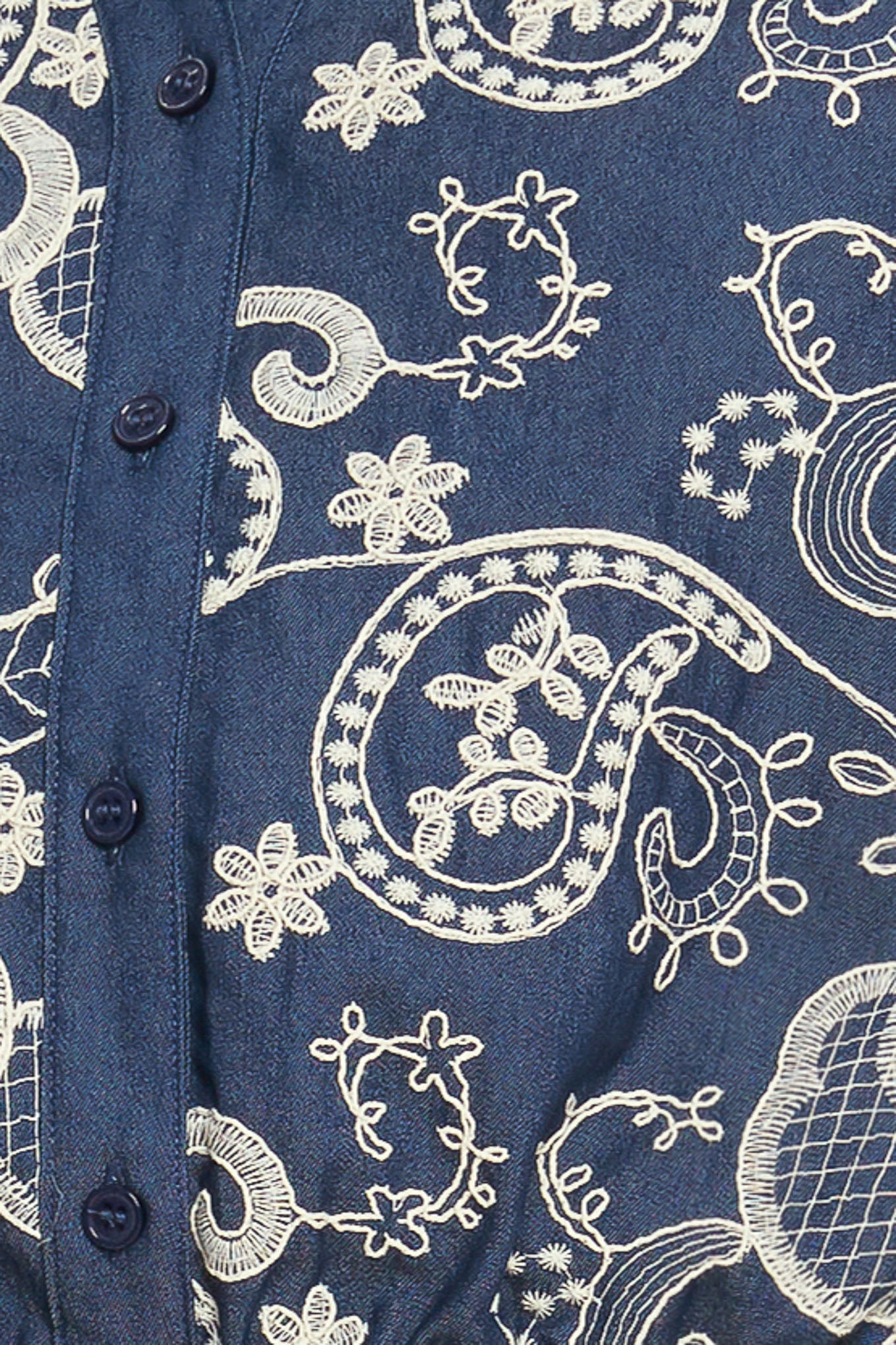 A solid and embroidery combination top featuring collar, V neck, short sleeve, front button down and elasticized waist. Matching skort IP9180T

Details:

Self: 100% Cotton

Contrast: 100% Cotton

Size & Fit

-Model is 5`8" And Wearing Size Small
-Measurements Taken From Size Small
-Approx. Length: 20"