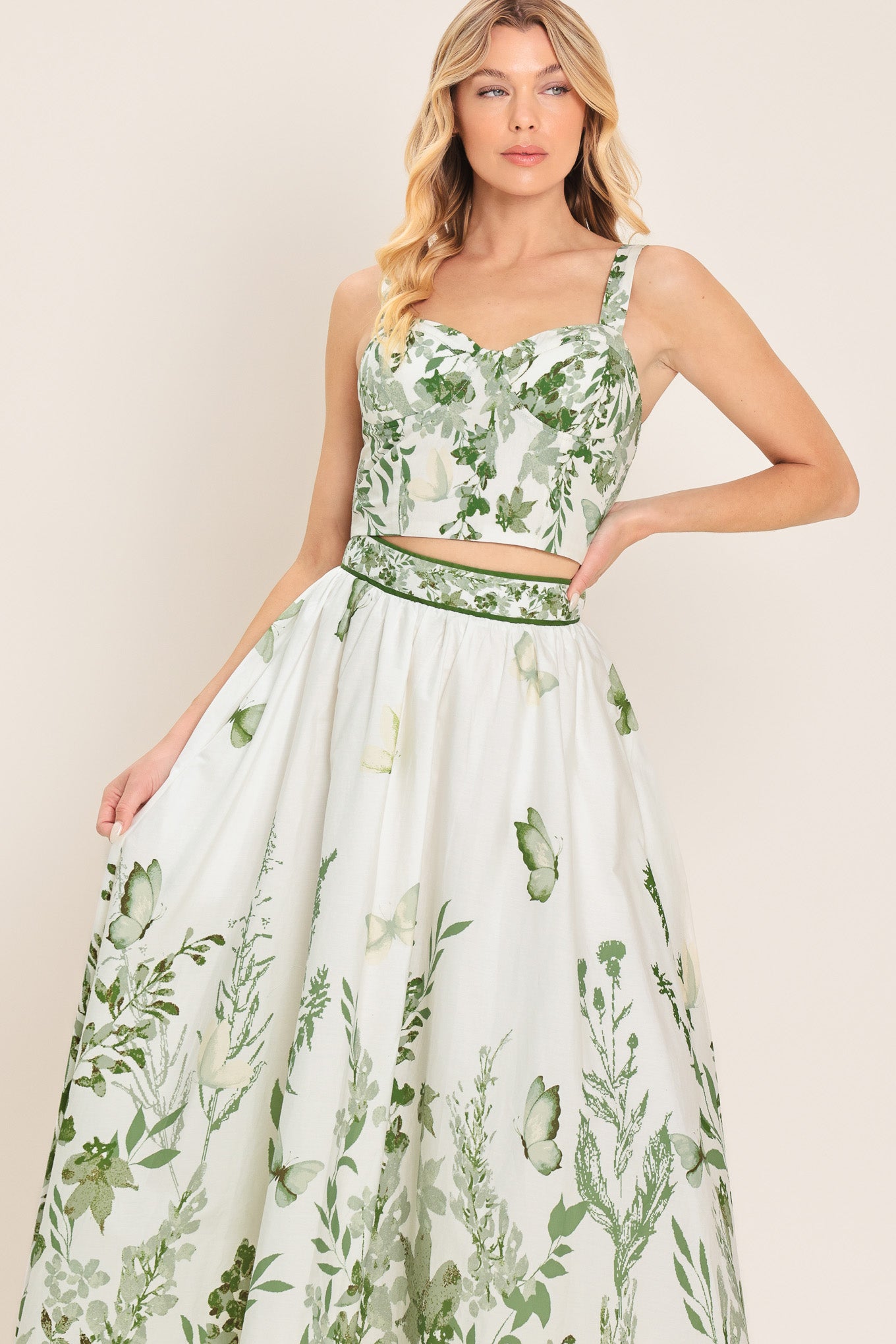 Woman wearing a green floral crop bustier top with smocked back bodice | Flying Tomato