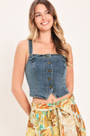 Woman wearing a denim button down crop top | Flying Tomato