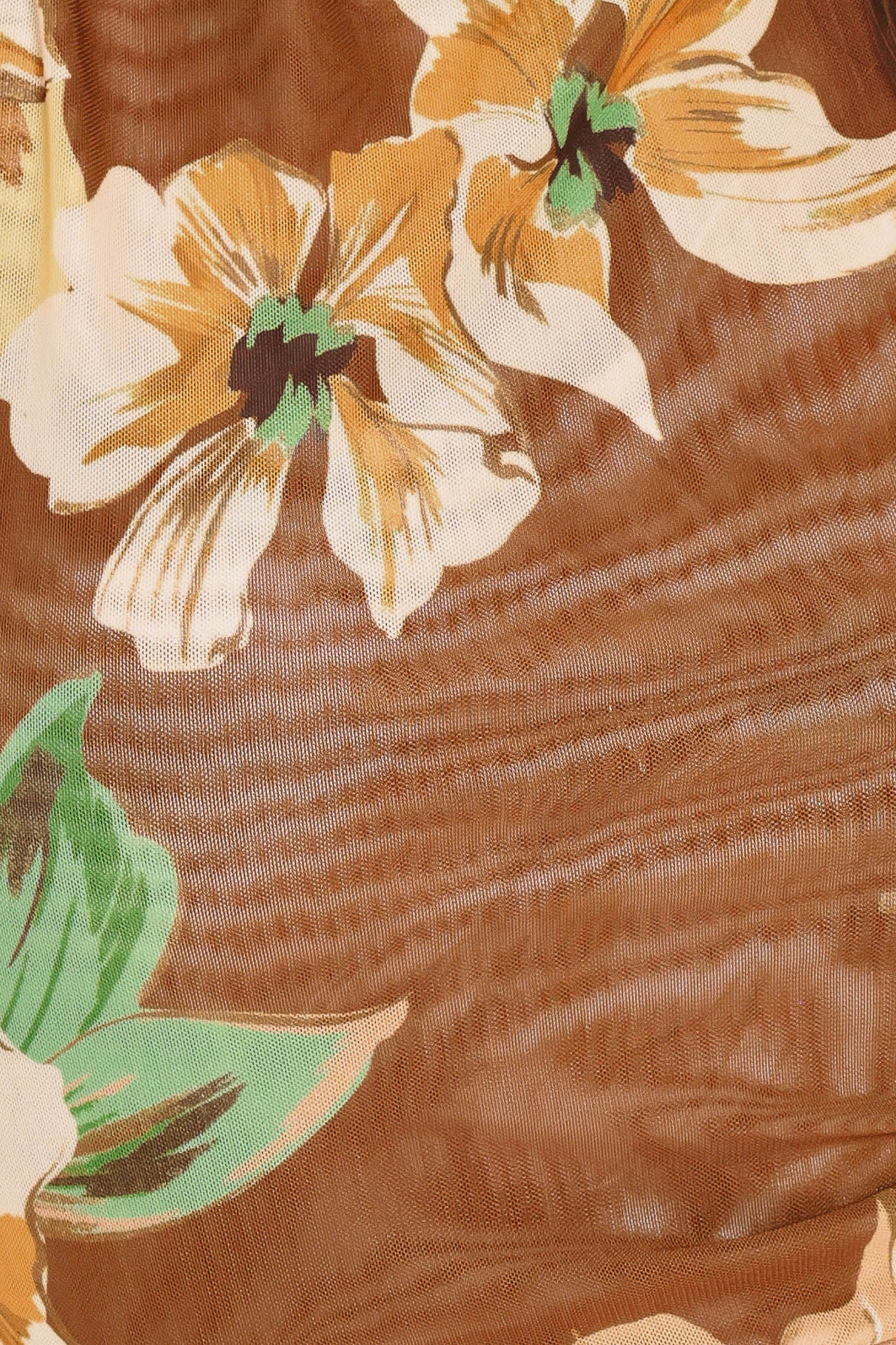 Woman wearing a brown floral sleeveless power mesh with funnel neck and side shirring | Flying Tomato
