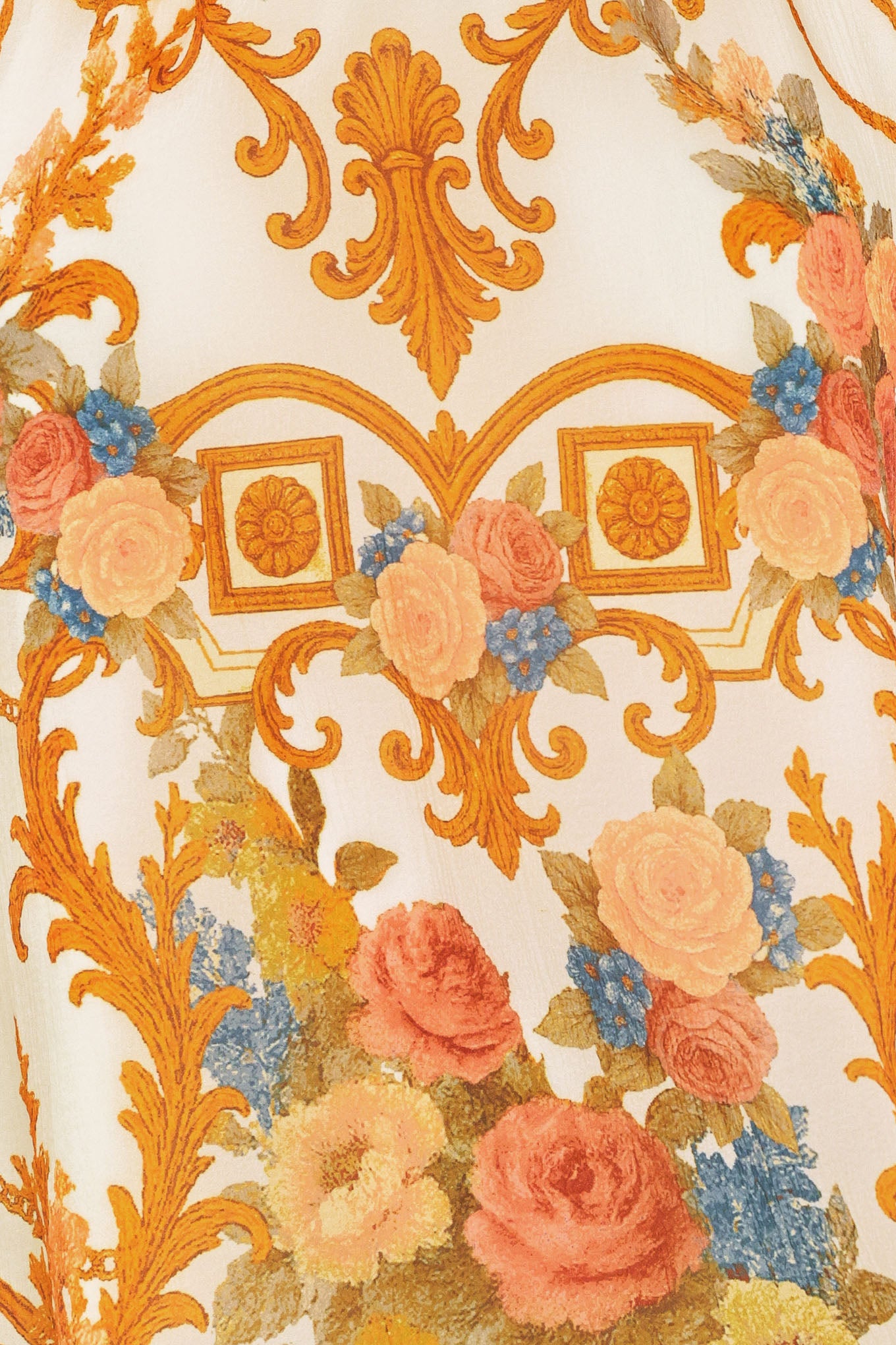 Woman wearing a sleeveless floral and geometric baroque patterned top | Flying Tomato