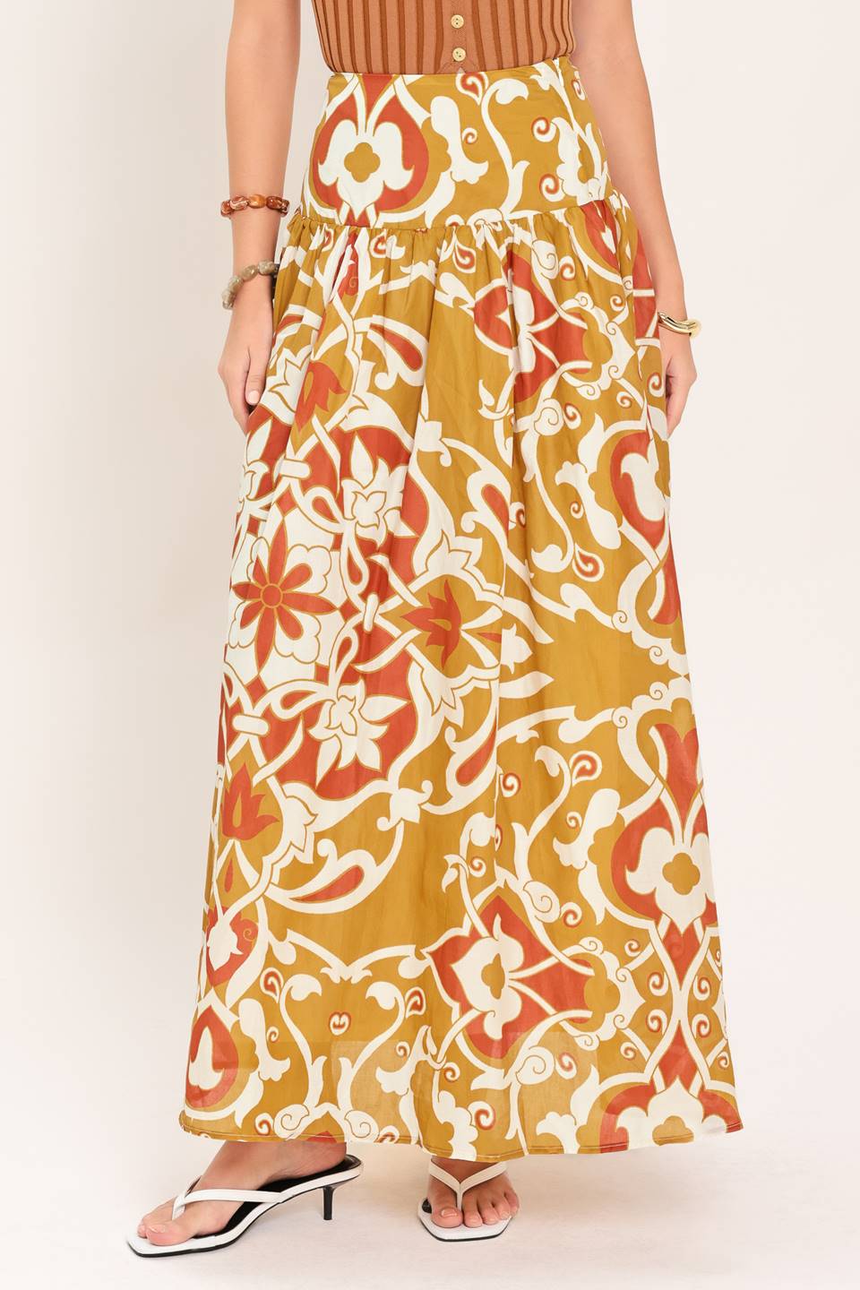 Woman wearing a camel multicolor printed two-piece top and skirt set | Flying Tomato