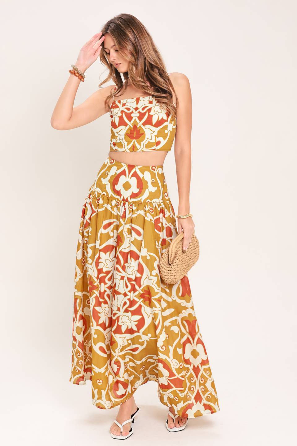 Woman wearing a camel multicolor printed two-piece top and skirt set | Flying Tomato