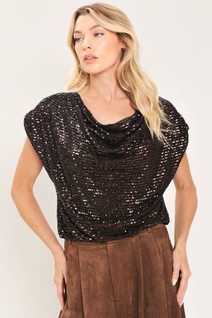 Woman wearing a cropped dark brown sequins top with a cowl neckline and overall slouchy look | Flying Tomato