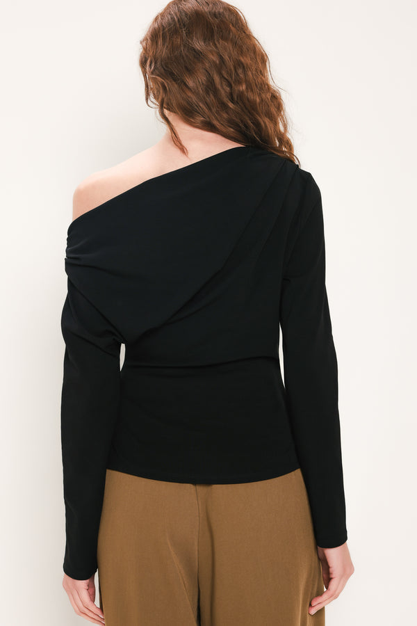 Woman wearing a long sleeve asymmetrical neck black top | Flying Tomato