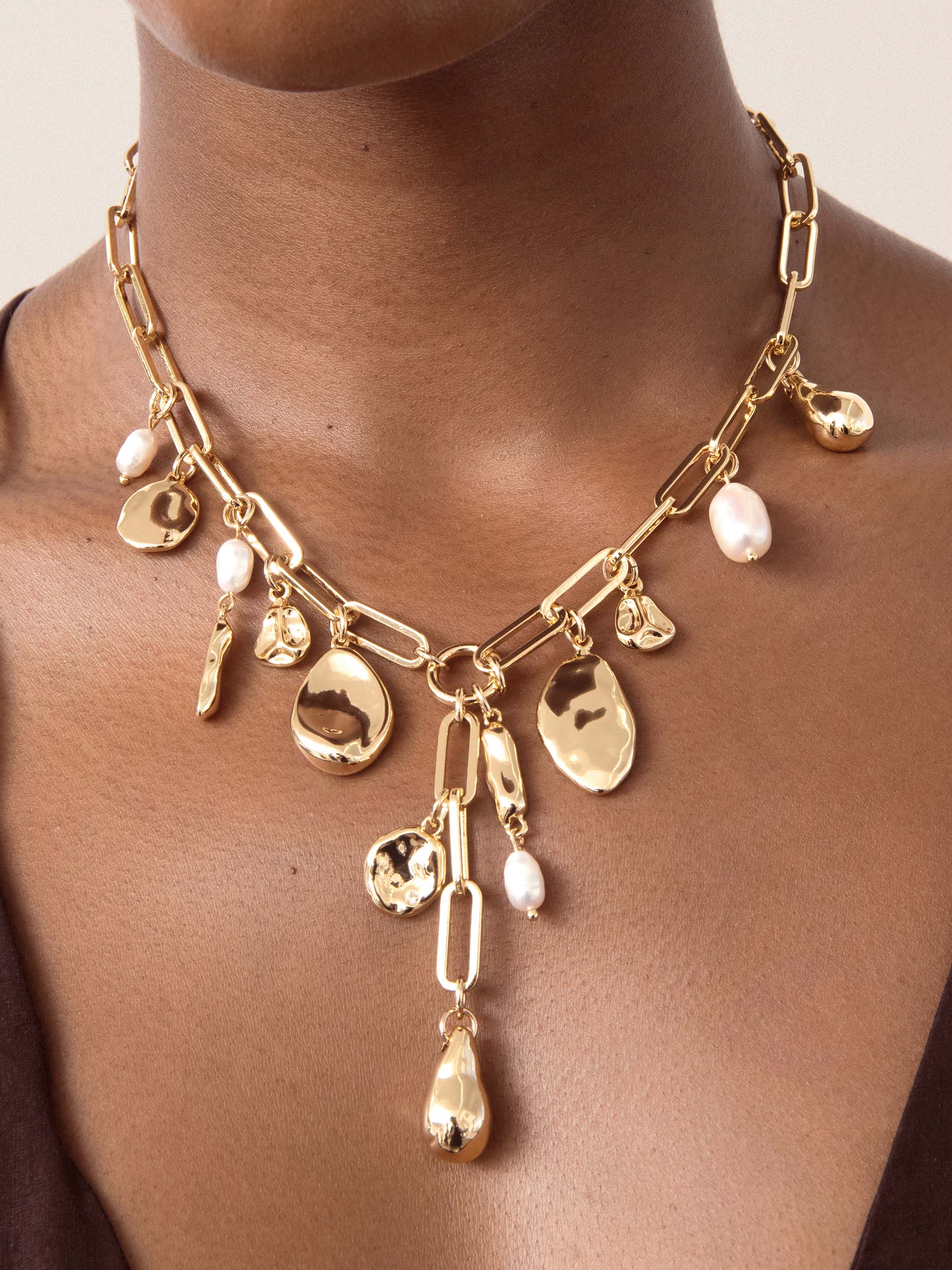 Melting Metal Charm Lariat.