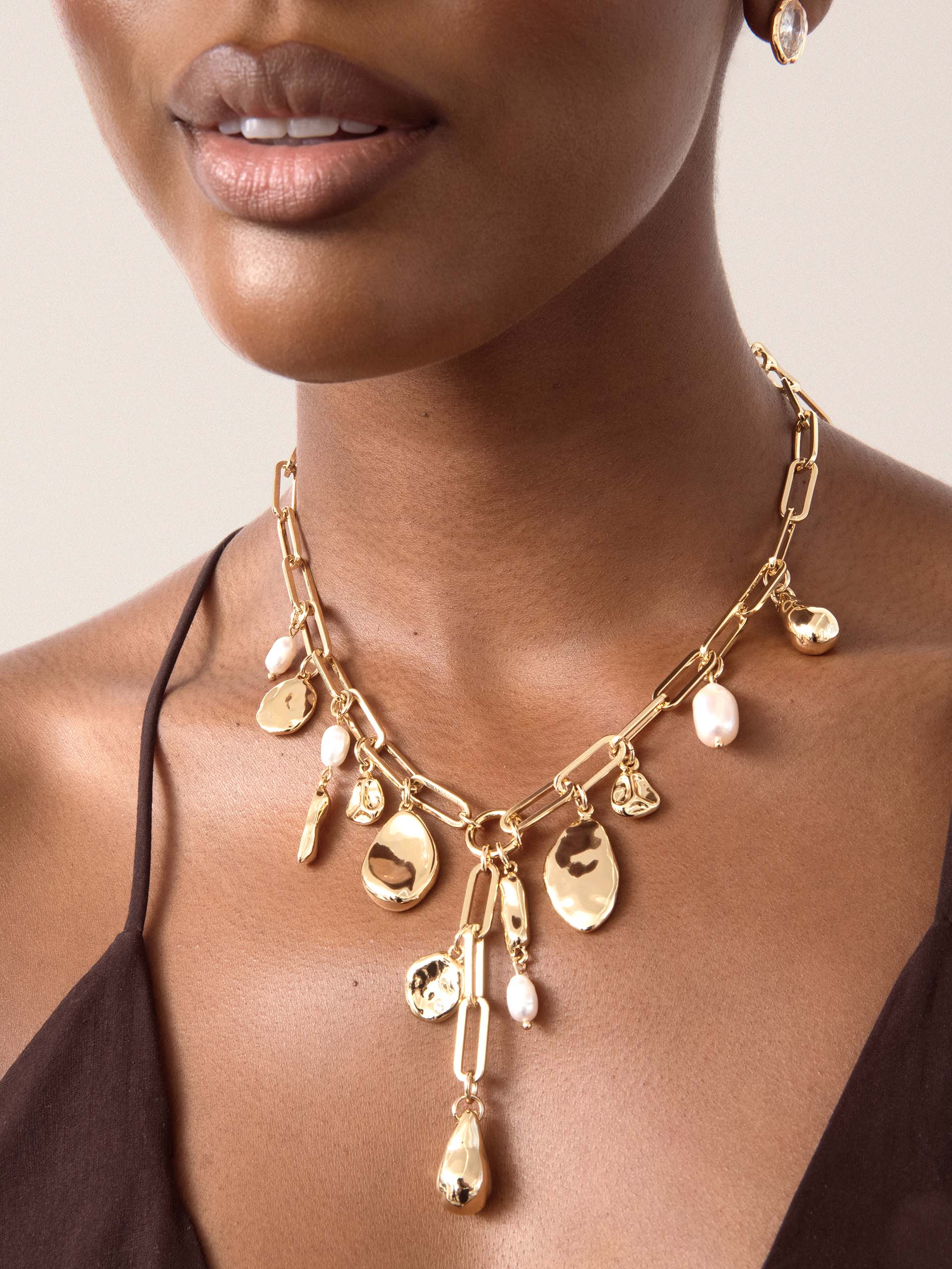 Melting Metal Charm Lariat.