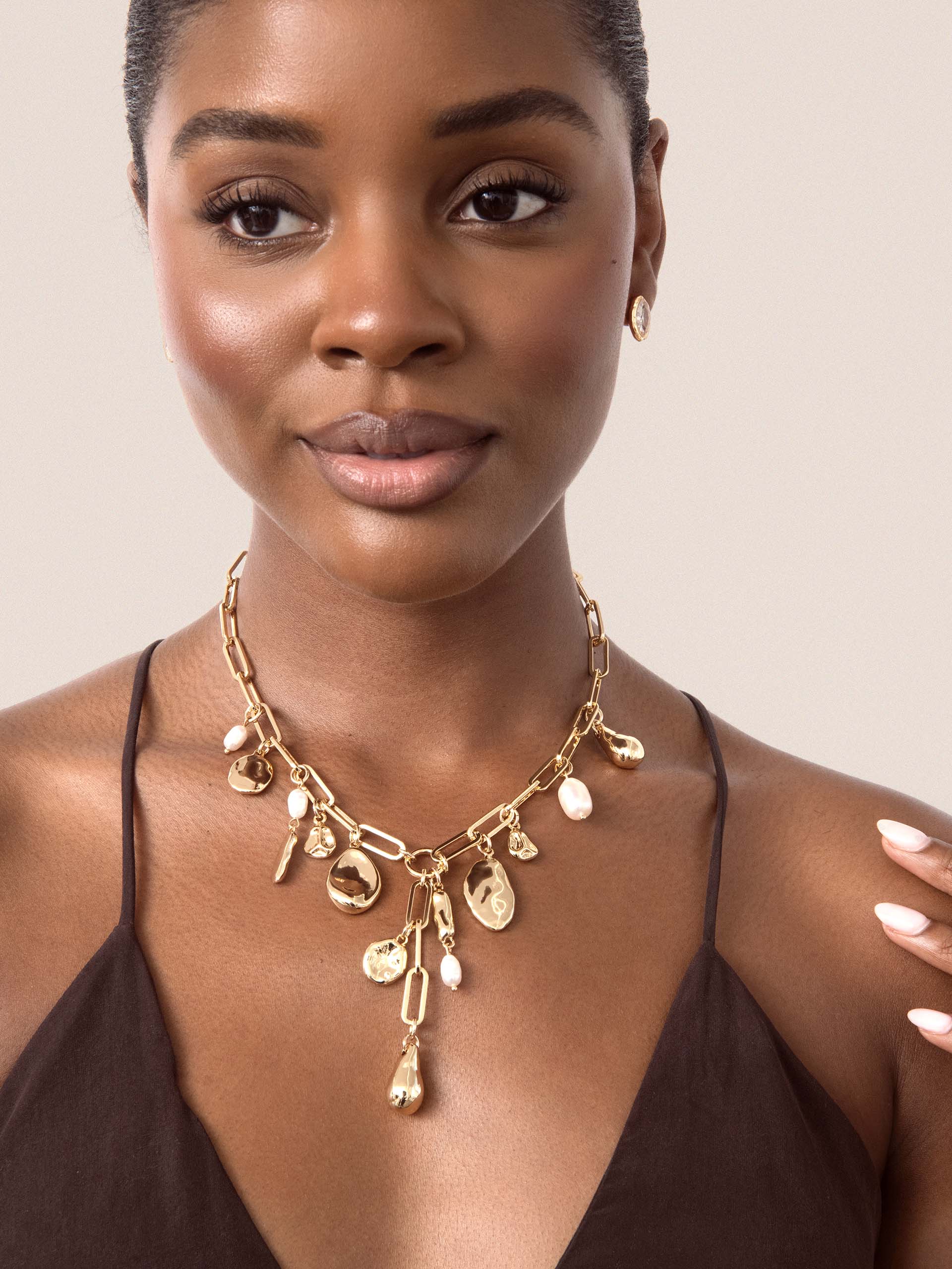 Melting Metal Charm Lariat.