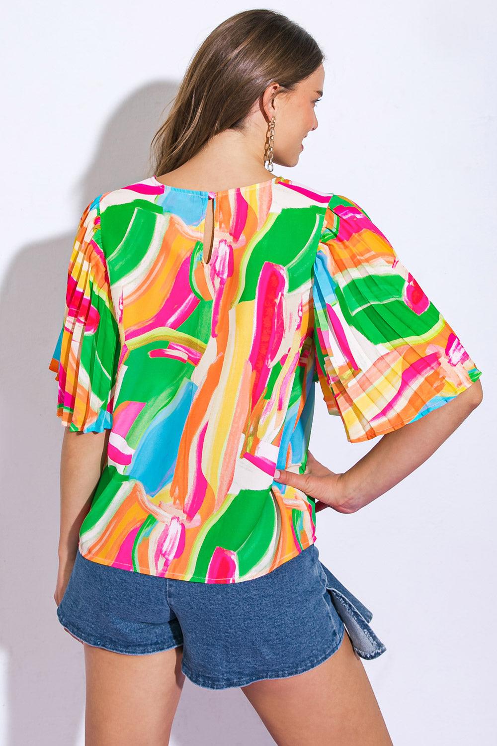 A printed woven top featuring round neckline, pleated angel sleeve and back neck button closure
Details:
Self : 100% Polyester
Size & Fit
- Model is 5`8" And Wearing Size Small
- Measurements Taken From Size Small
- Approx. Length: 22"