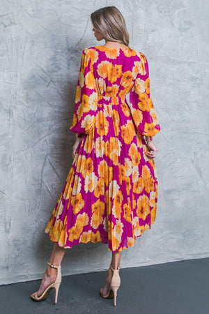 LOOK AT HER FLORAL WOVEN MIDI DRESS.