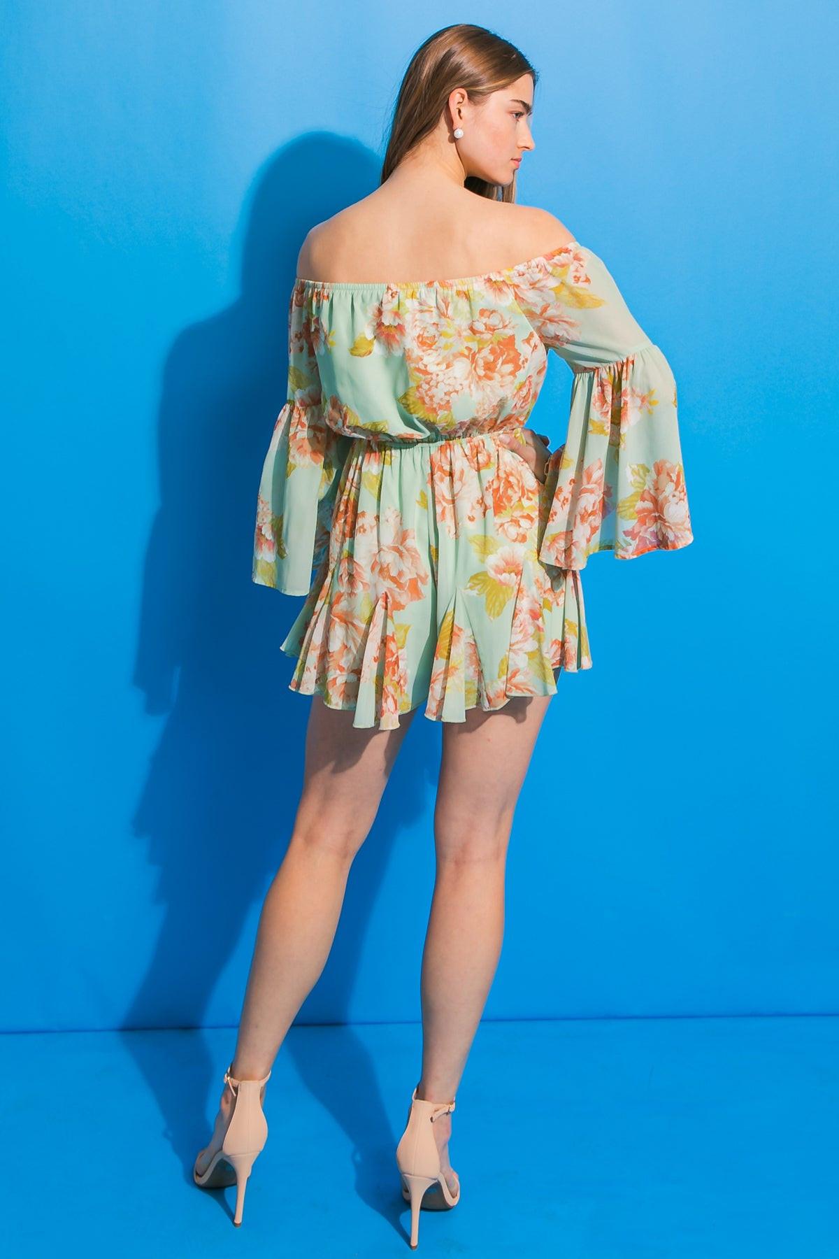 WE DON'T TALK ABOUT WOVEN ROMPER.