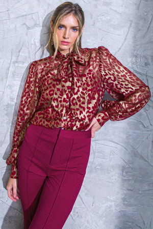 BEYOND COMPARE SEMI-SHEER TOP.