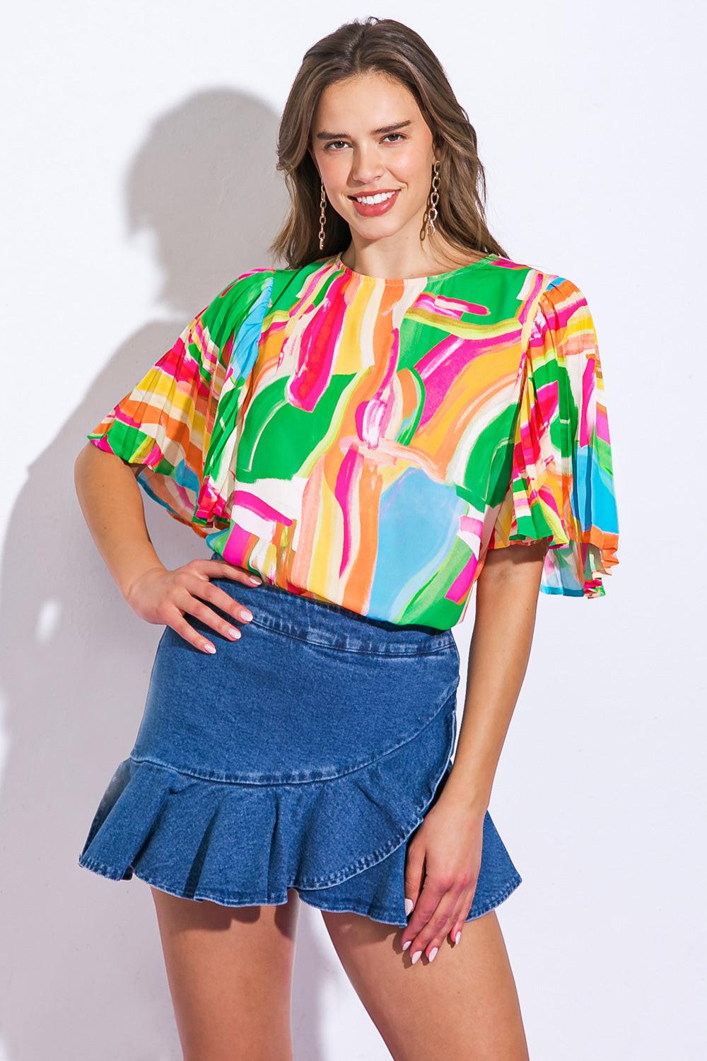 A printed woven top featuring round neckline, pleated angel sleeve and back neck button closure
Details:
Self : 100% Polyester
Size & Fit
- Model is 5`8" And Wearing Size Small
- Measurements Taken From Size Small
- Approx. Length: 22"