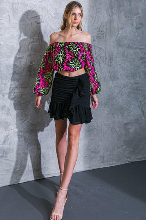 PEOPLE LOVING GOOD VIBRATIONS MINI SKIRT.