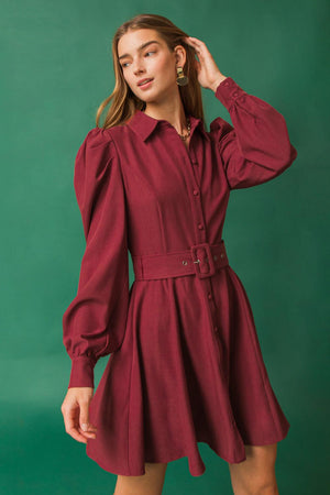 WRAPPED UP IN LOVE MINI DRESS.