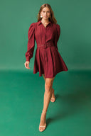 WRAPPED UP IN LOVE MINI DRESS.