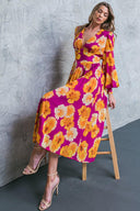 LOOK AT HER FLORAL WOVEN MIDI DRESS.